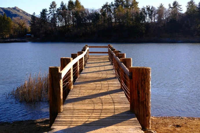 a wooden bridge over a body of water